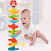 Picture of multi-coloured tower with balls and animal figure on the top
